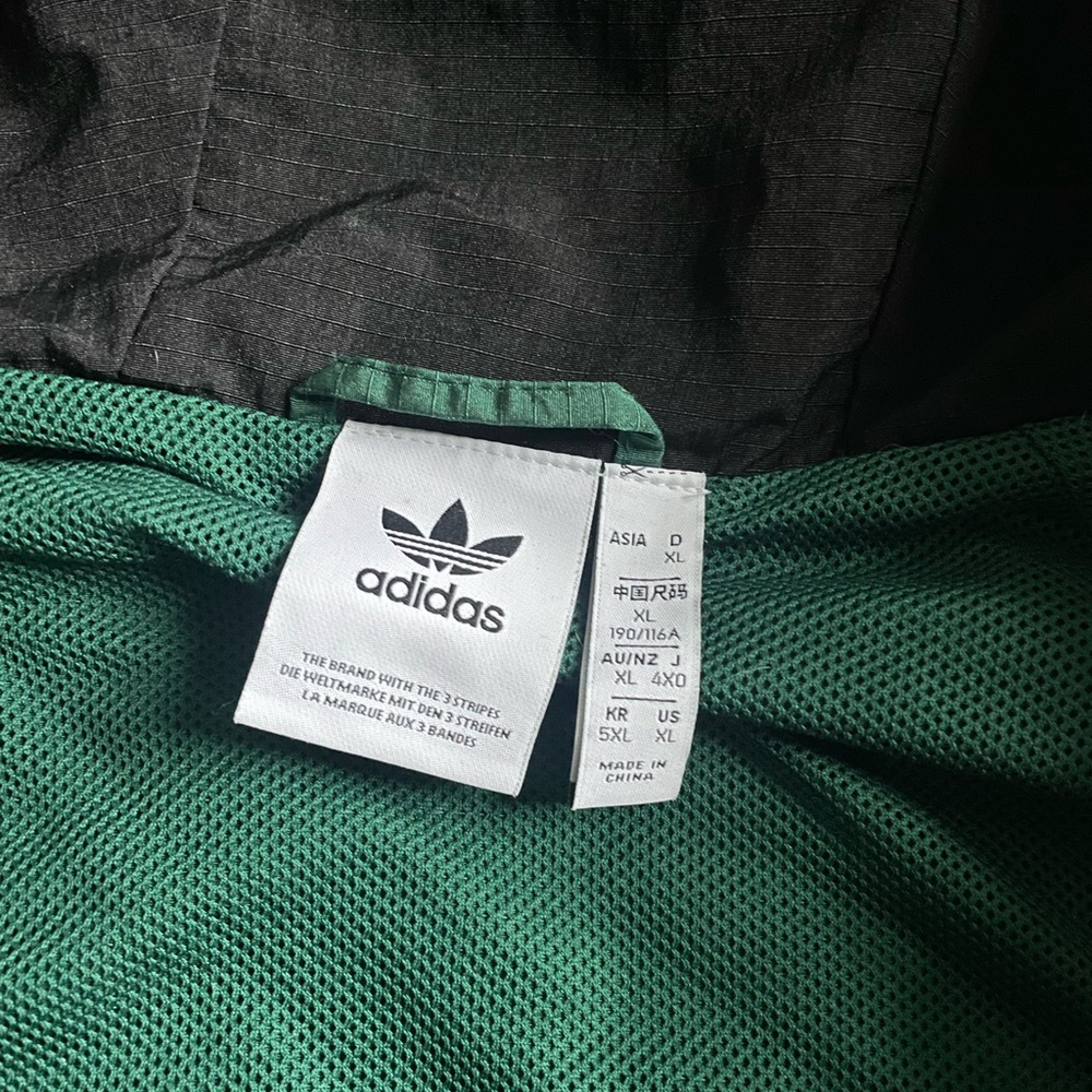 Vintage Adidas windbreaker 
Mens XL 
Dark green